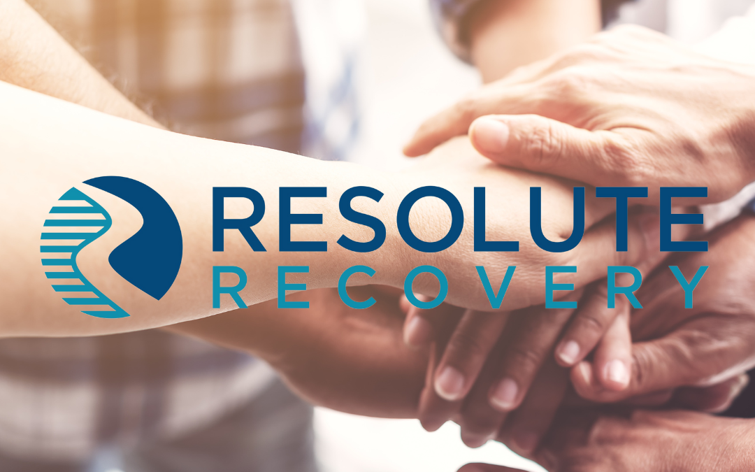 Group of people with hands together to symbolize community. Resolute Recovery Logo as overlay